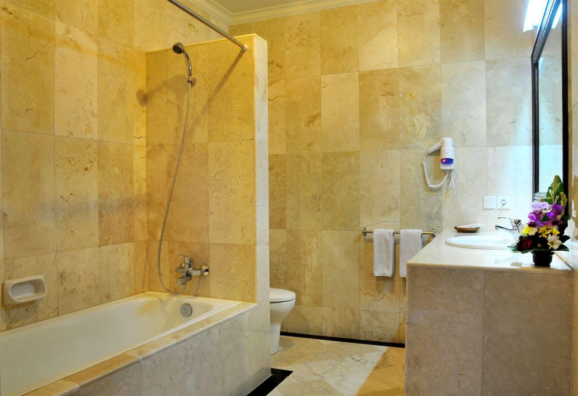 Puri Yuma Hotel Denpasar Esterno foto